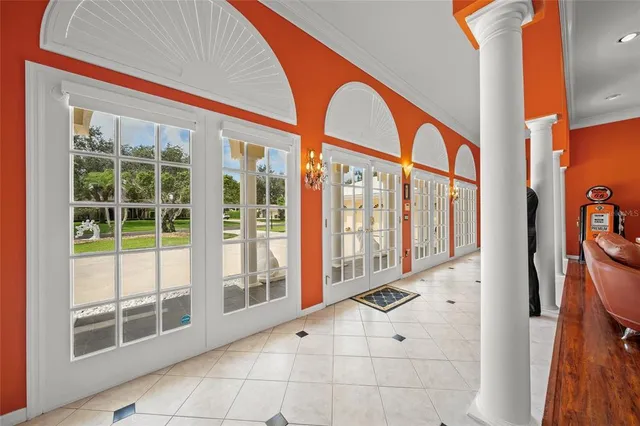 a view of an entryway with sitting space and balcony