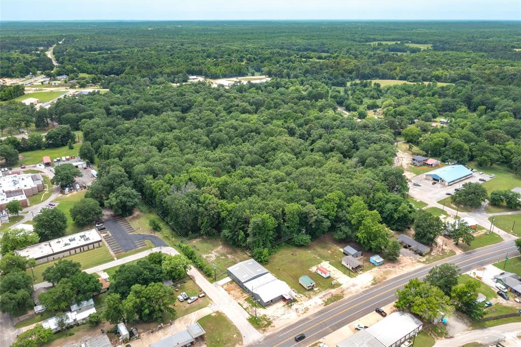 154 East Highway 154 Quitman, TX 75783 - Photo 3 of 9 an aerial view of residential houses with outdoor space and trees