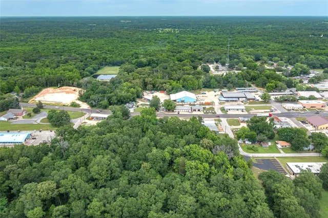 a view of a lake with a yard