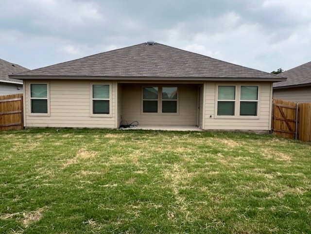 519 Wyatt Way Jarrell, TX 76537 - Photo 12 of 12 a front view of a house with garden