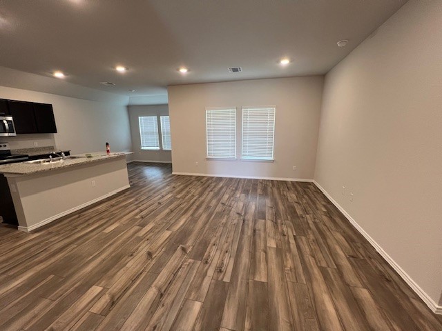 519 Wyatt Way Jarrell, TX 76537 - Photo 3 of 12 a view of a livingroom with kitchen and furniture