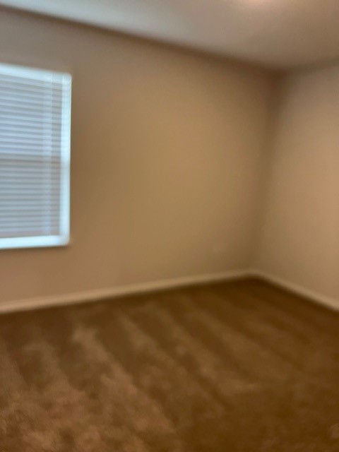 519 Wyatt Way Jarrell, TX 76537 - Photo 8 of 12 a view of an empty room with a window