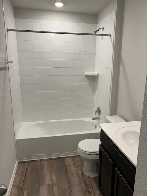 519 Wyatt Way Jarrell, TX 76537 - Photo 9 of 12 a bathroom with a sink a toilet and shower