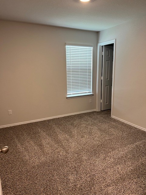 519 Wyatt Way Jarrell, TX 76537 - Photo 10 of 12 an empty room with a window