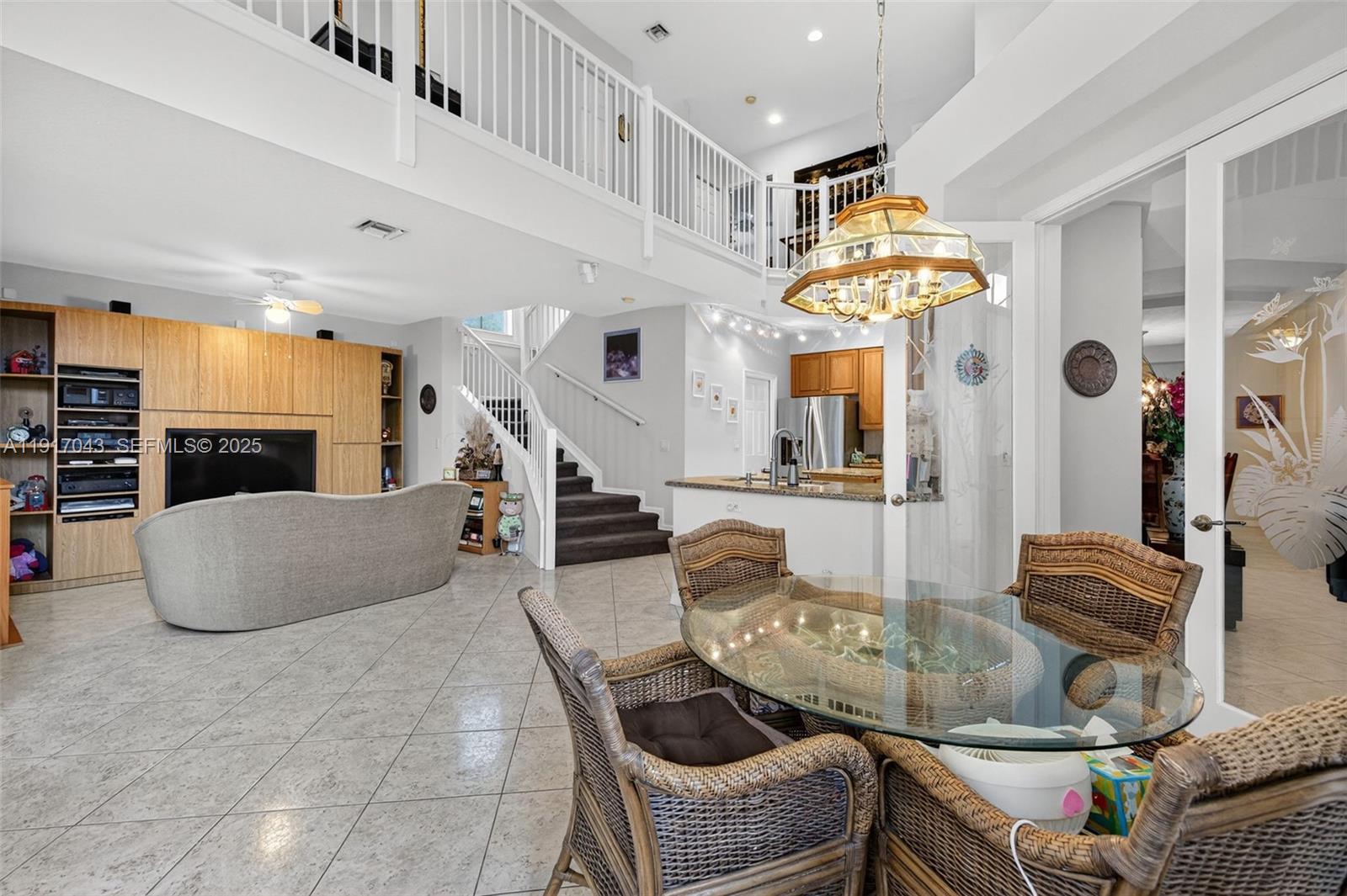 4123 West Lake Estates Drive Davie, FL 33328 - Photo 15 of 56 a living room with furniture and flat screen tv
