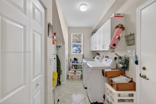 a bathroom with a sink double vanity and a mirror