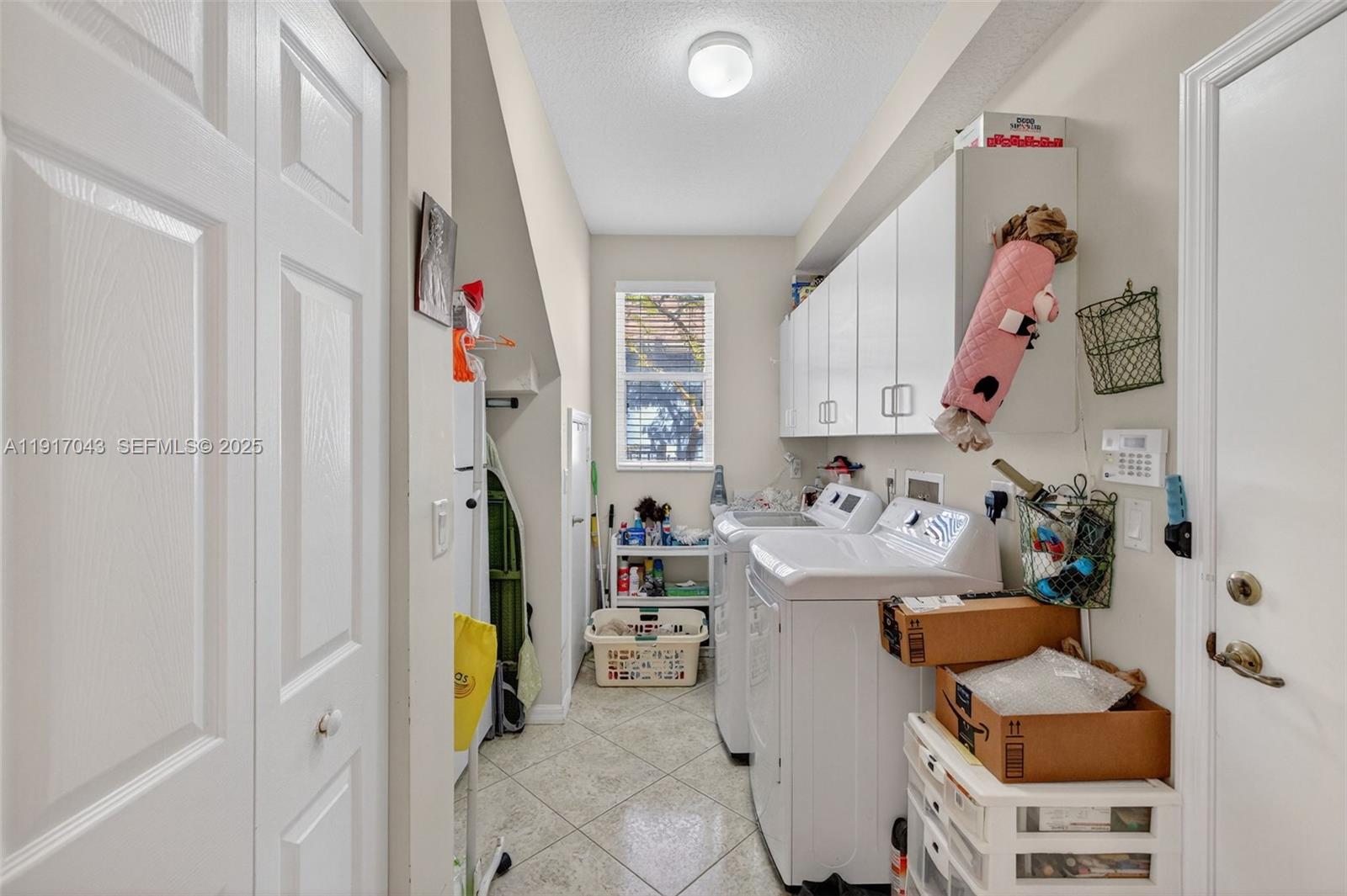 4123 West Lake Estates Drive Davie, FL 33328 - Photo 20 of 56 a room with storage and utility