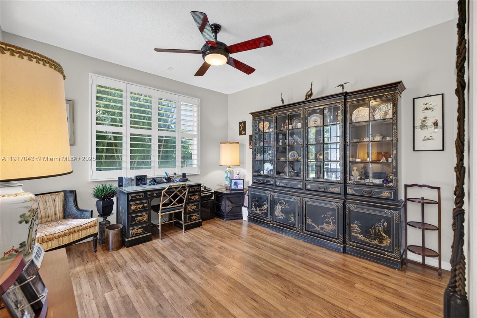 4123 West Lake Estates Drive Davie, FL 33328 - Photo 29 of 56 a living room with furniture and wooden floor