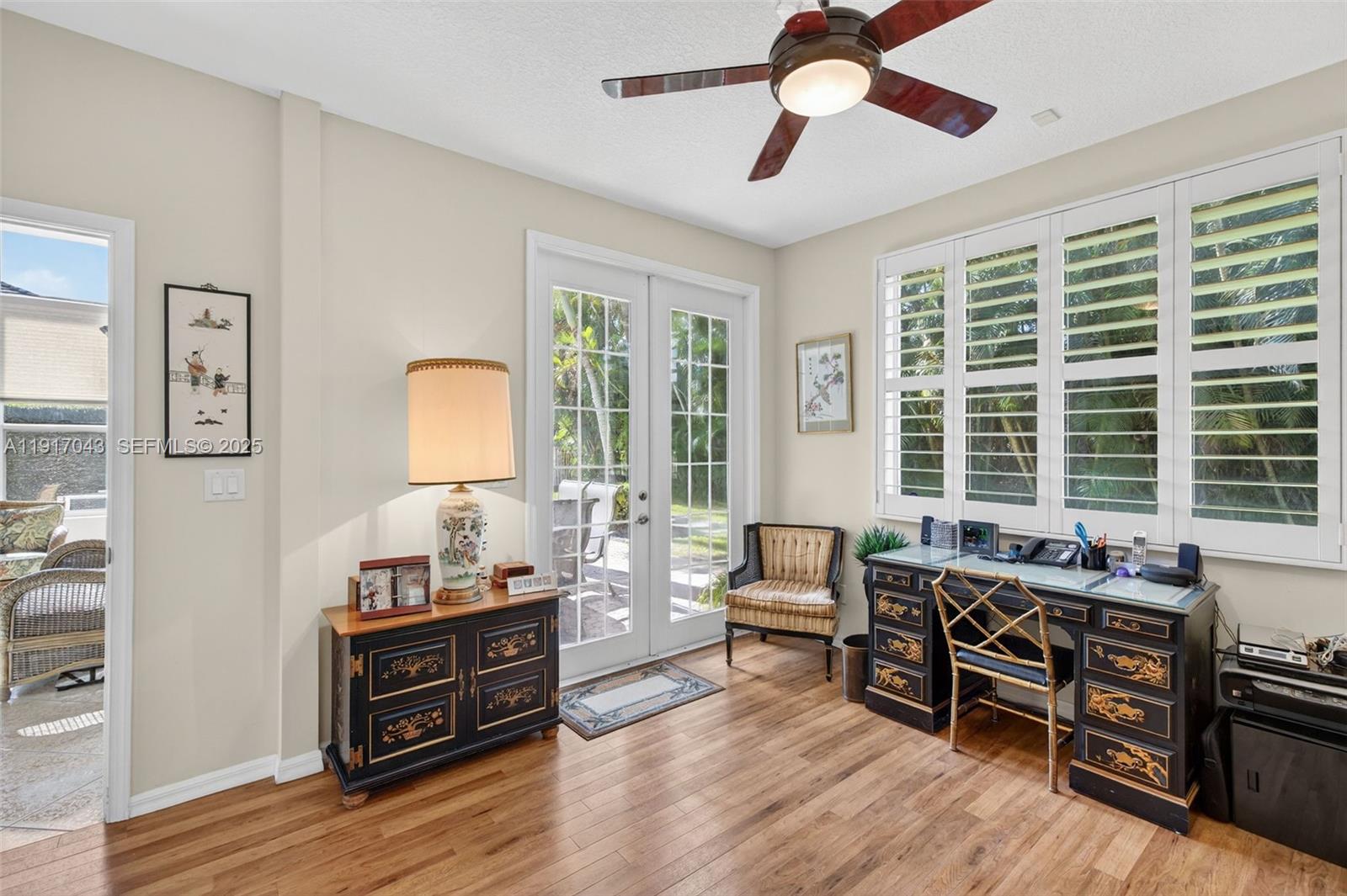 4123 West Lake Estates Drive Davie, FL 33328 - Photo 30 of 56 a living room with furniture and large windows