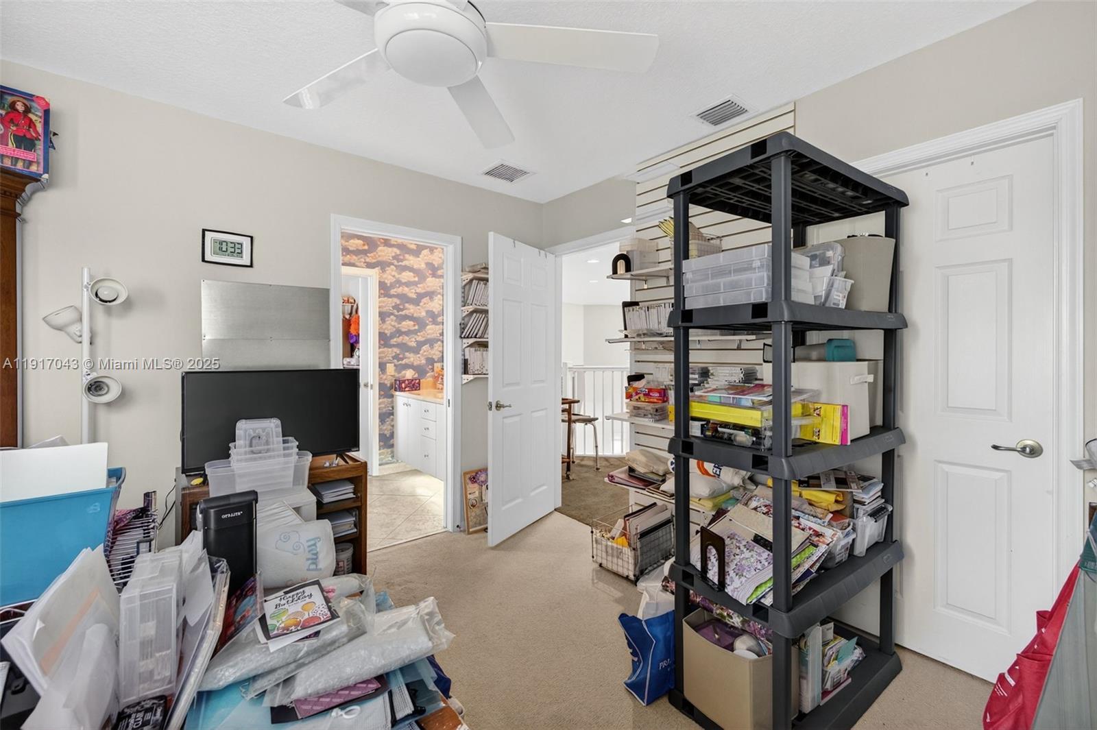 4123 West Lake Estates Drive Davie, FL 33328 - Photo 41 of 56 a bedroom with a workspace