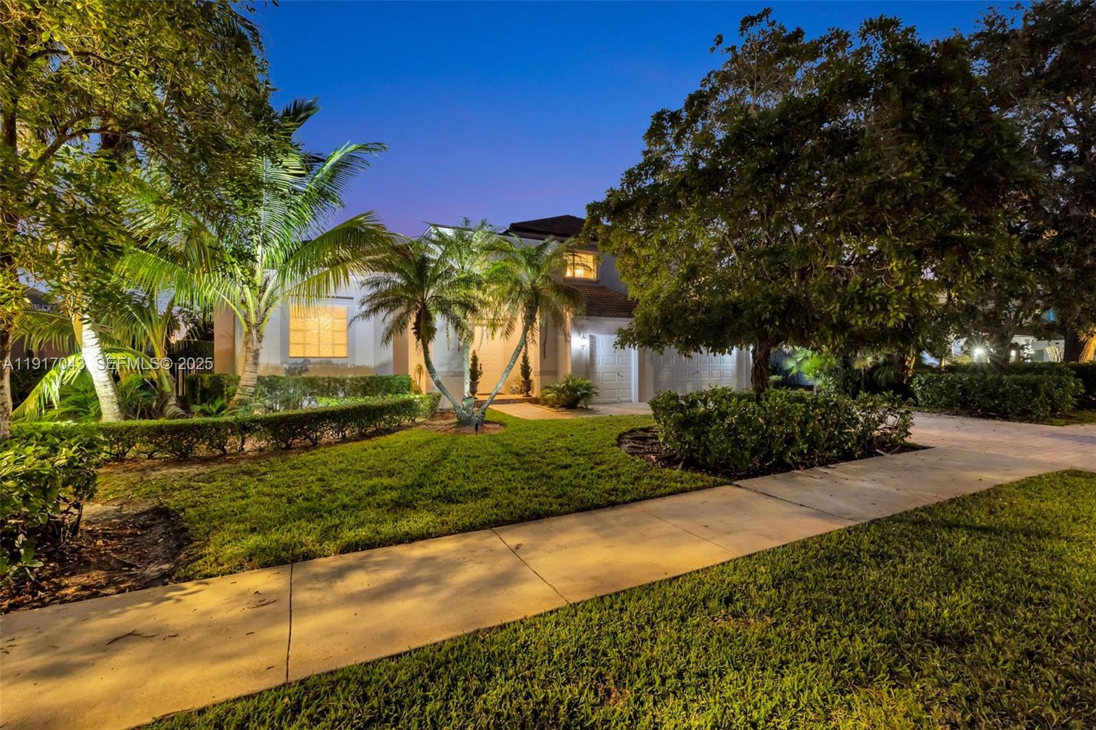 4123 West Lake Estates Drive Davie, FL 33328 - Photo 50 of 56 a view of a backyard