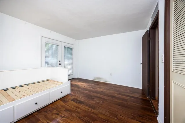 a view of an empty room and window