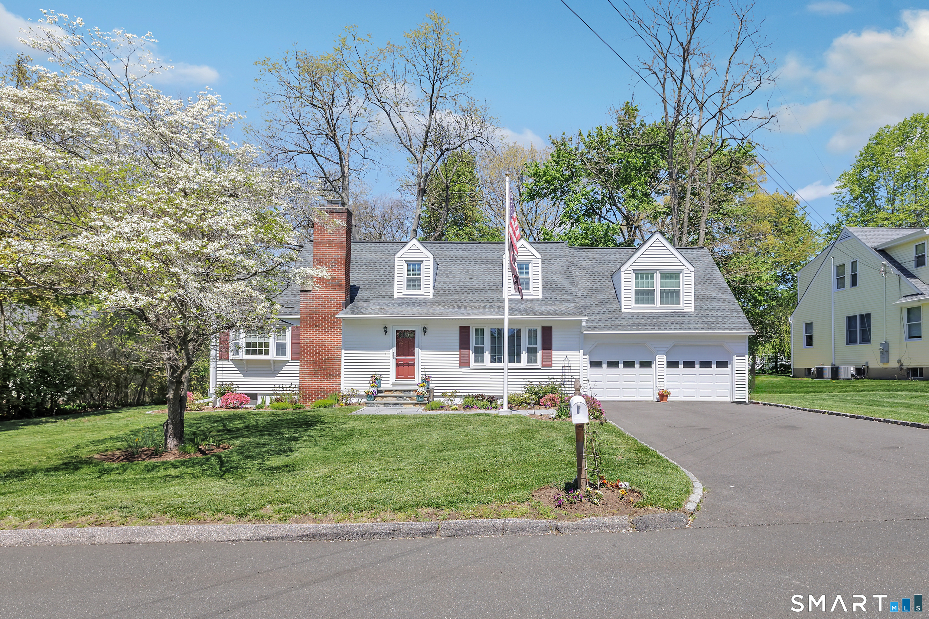 58 Colony Avenue Trumbull, CT 06611 - Photo 1 of 38 a front view of house with yard and green space