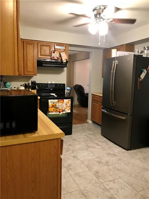 2884 South Bridge Road Washington, PA 15301 - Photo 12 of 17 a kitchen with stainless steel appliances granite countertop a refrigerator and a stove