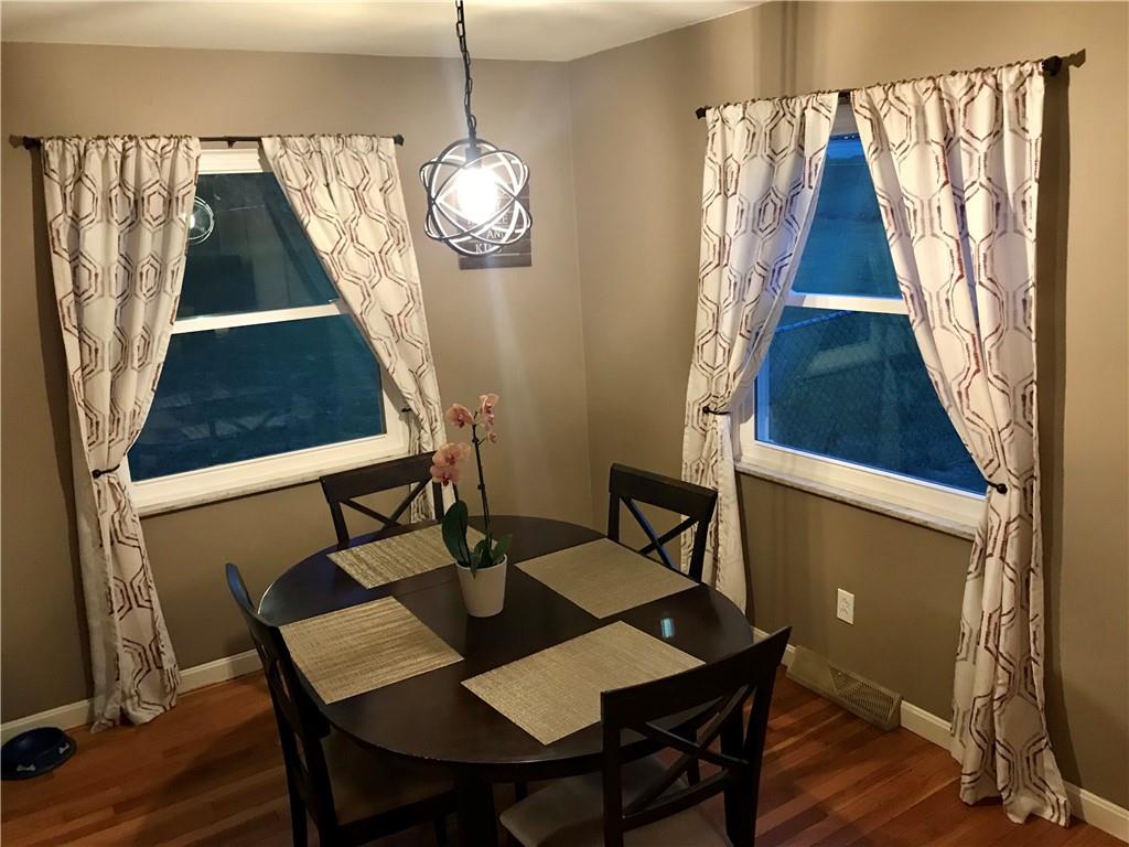 2884 South Bridge Road Washington, PA 15301 - Photo 17 of 17 a view of a dining room with furniture and wooden floor