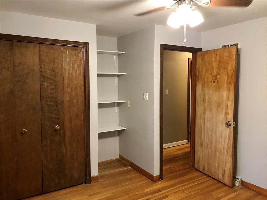 2884 South Bridge Road Washington, PA 15301 - Photo 4 of 17 a view of a bathroom with wooden floor and staircase