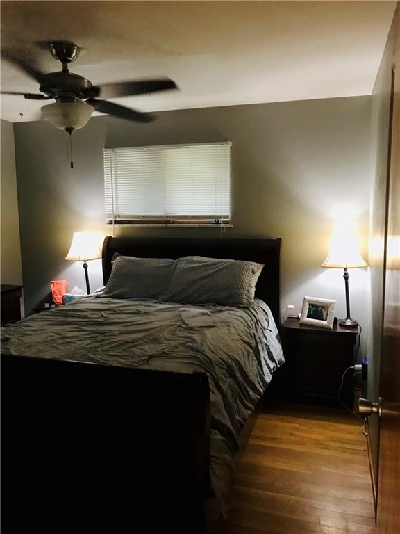 2884 South Bridge Road Washington, PA 15301 - Photo 5 of 17 a bedroom with a bed and wooden floor