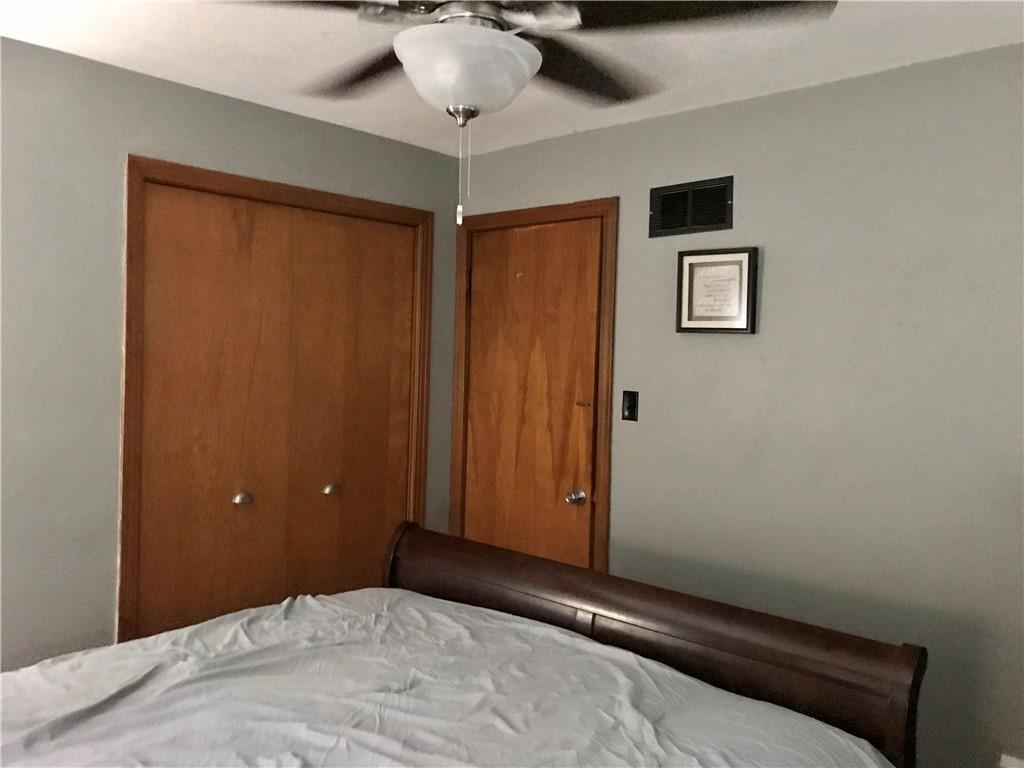 2884 South Bridge Road Washington, PA 15301 - Photo 6 of 17 a view of a livingroom with a ceiling fan and window
