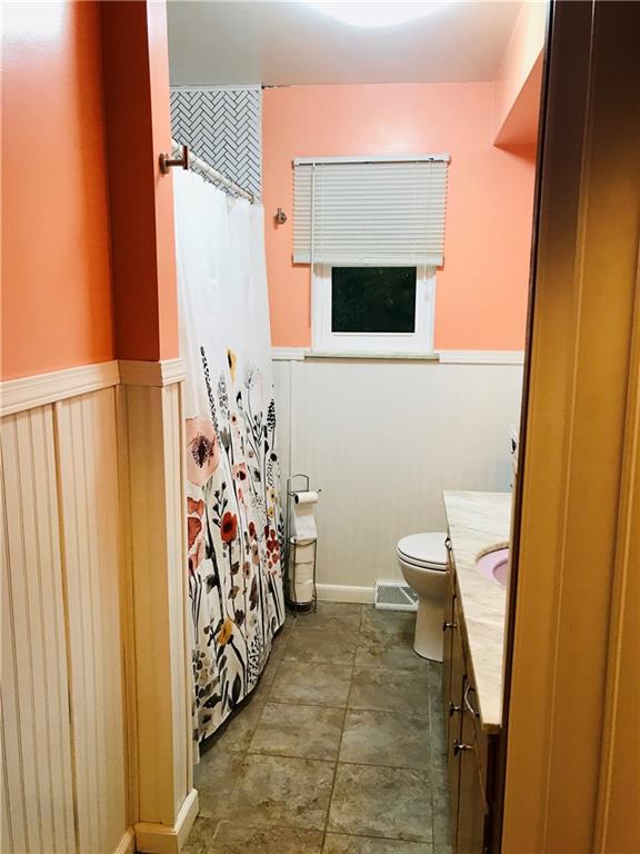 2884 South Bridge Road Washington, PA 15301 - Photo 9 of 17 a bathroom with a toilet and a shower