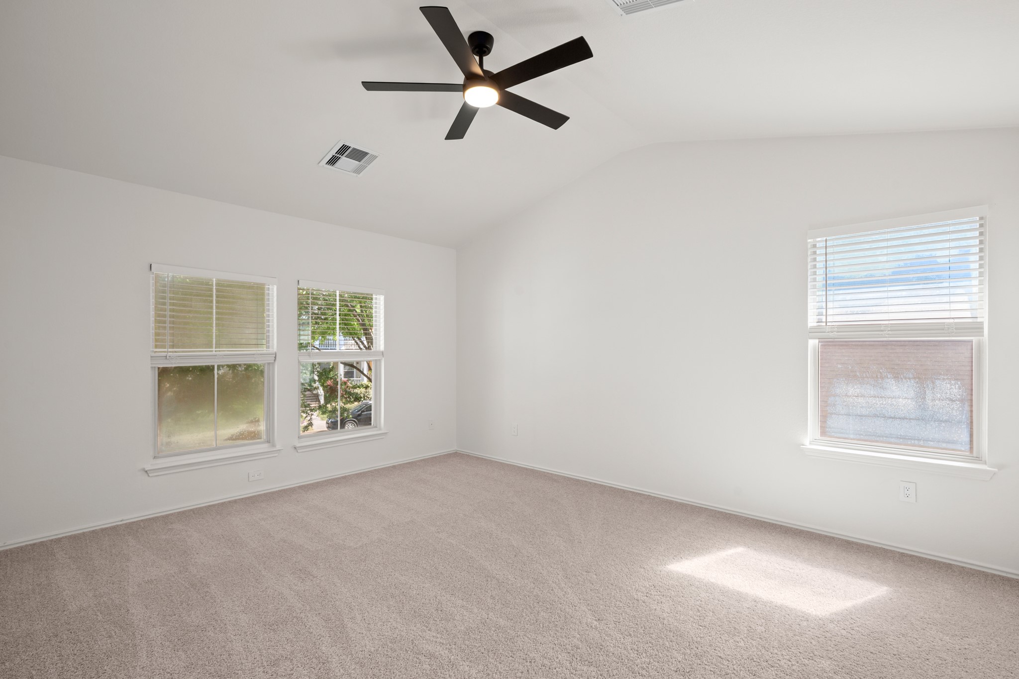 360 Sampson Kyle, TX 78640 - Photo 20 of 36 Vaulted ceiling featuring a black ceiling fan with integrated lighting