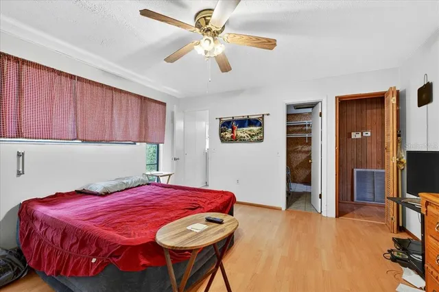 a bathroom with a sink a toilet and shower curtain