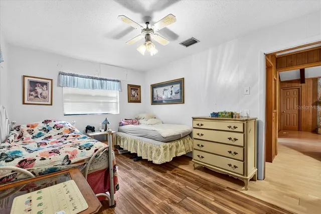 a view of a livingroom with gym equipment