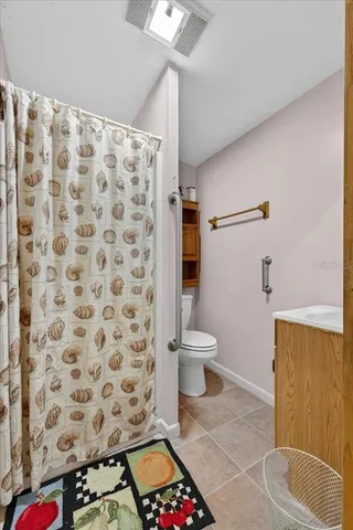 a kitchen with stainless steel appliances granite countertop a stove and a refrigerator