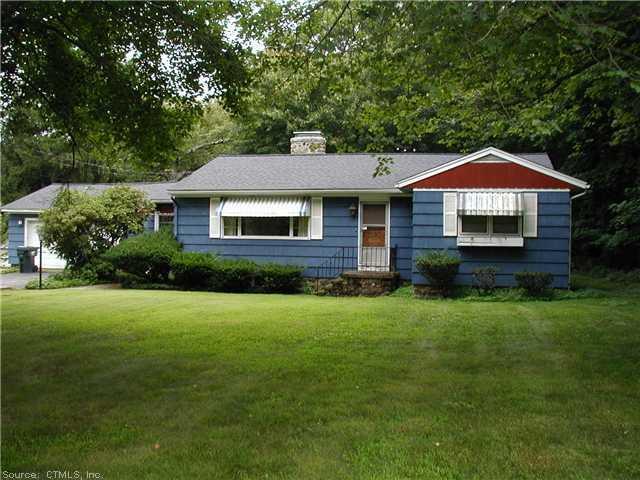 Exterior Front. View from curb, level property, lightly wooded rear yardwith privacy. New roof!
