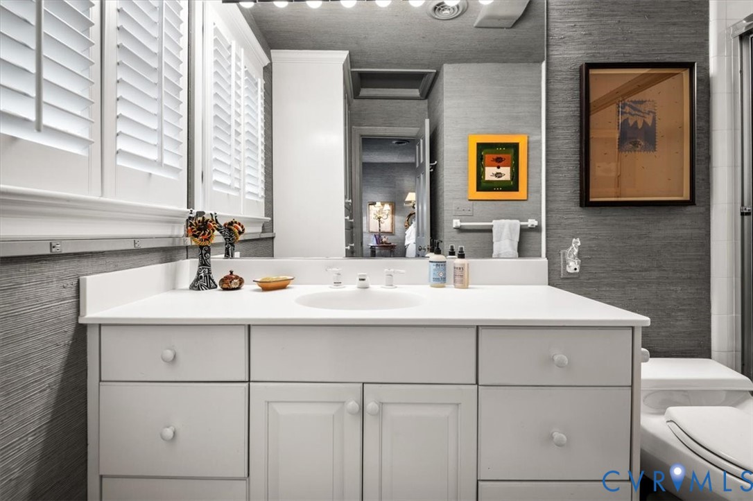 14335 Horseshoe Ford Road Ashland, VA 23005 - Photo 41 of 64 a bathroom with a sink and a mirror