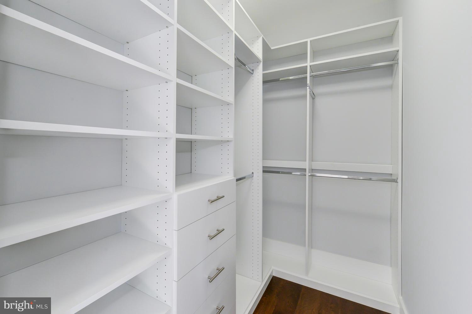 6729 Piney Branch Road Northwest Washington, DC 20012 - Photo 15 of 30 a view of walk in closet with empty racks