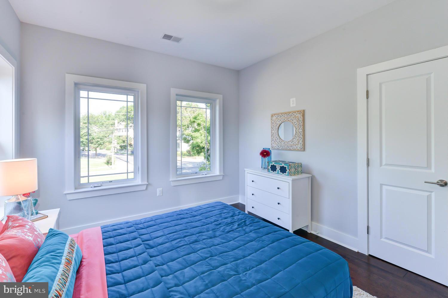 6729 Piney Branch Road Northwest Washington, DC 20012 - Photo 21 of 30 a bedroom with a bed and a dresser