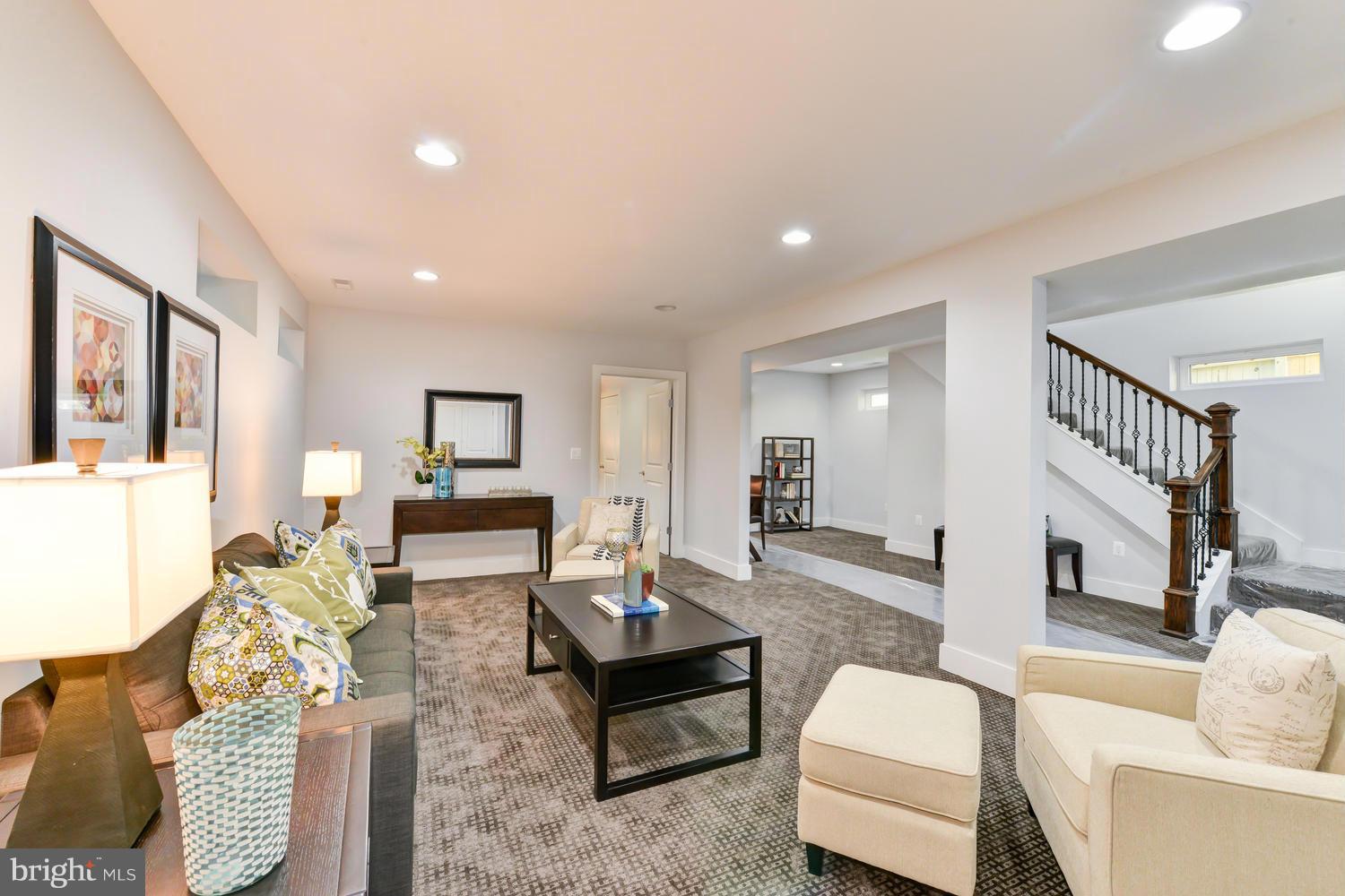 6729 Piney Branch Road Northwest Washington, DC 20012 - Photo 25 of 30 a living room with furniture and a table
