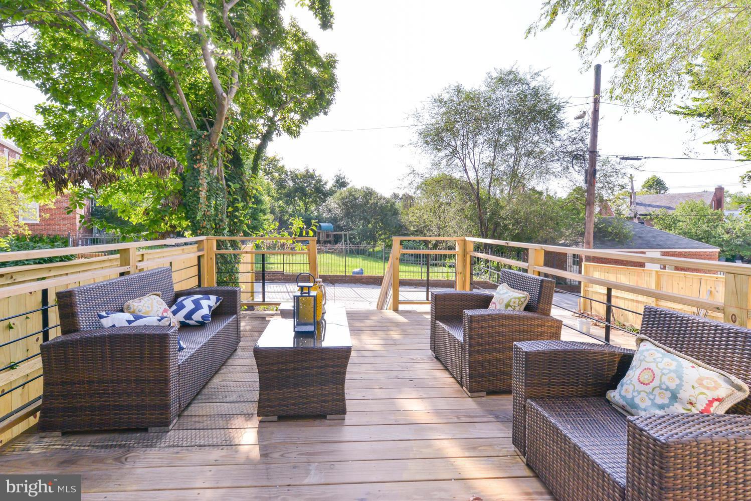 6729 Piney Branch Road Northwest Washington, DC 20012 - Photo 30 of 30 an outdoor living room with furniture and garden view