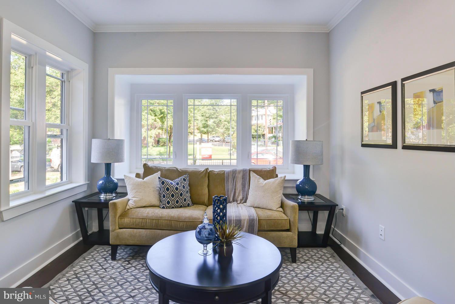6729 Piney Branch Road Northwest Washington, DC 20012 - Photo 4 of 30 a living room with furniture and a large window