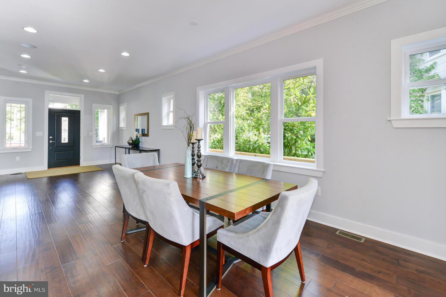 6729 Piney Branch Road Northwest Washington, DC 20012 - Photo 7 of 30 a dining room with furniture and wooden floor