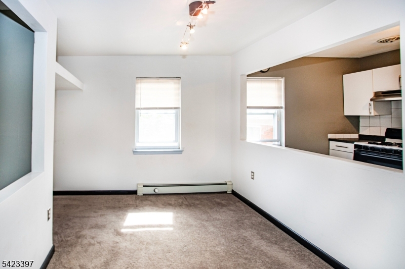 1130 Valley Road, Unit 2B Wayne, NJ 07470 - Photo 2 of 47 a view of a kitchen with wooden floor and a window