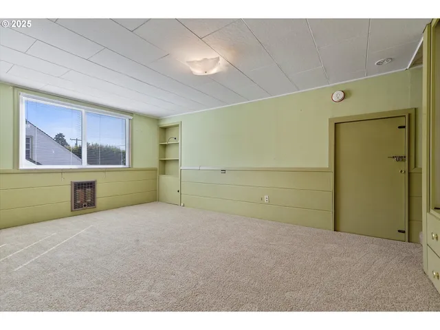 a bathroom with a sink mirror and vanity