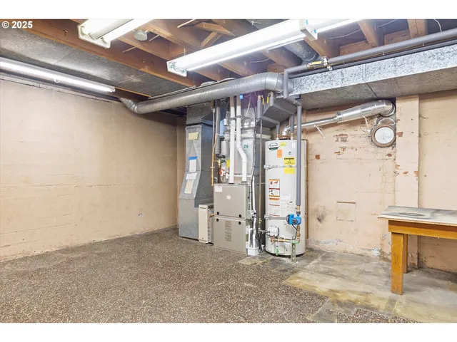 a view of a room with wooden walls