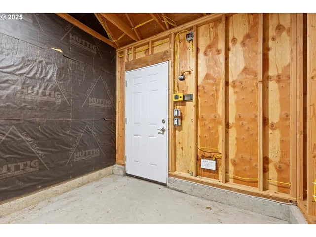 a view of multiple houses with city street