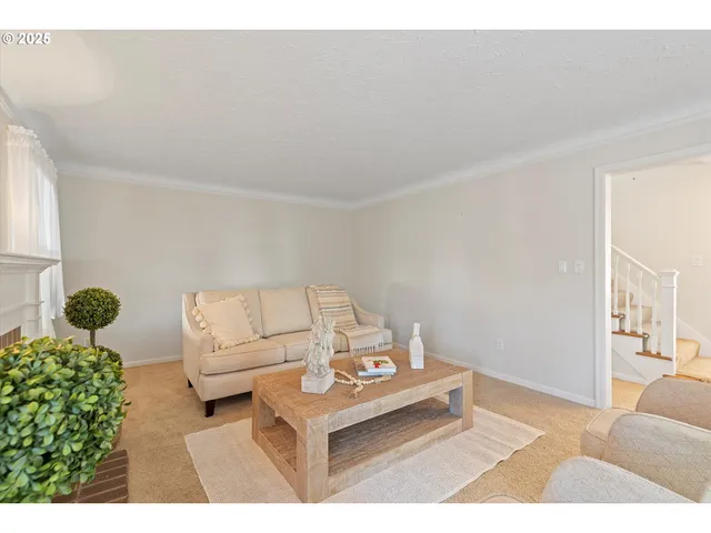 a living room with furniture and a couch