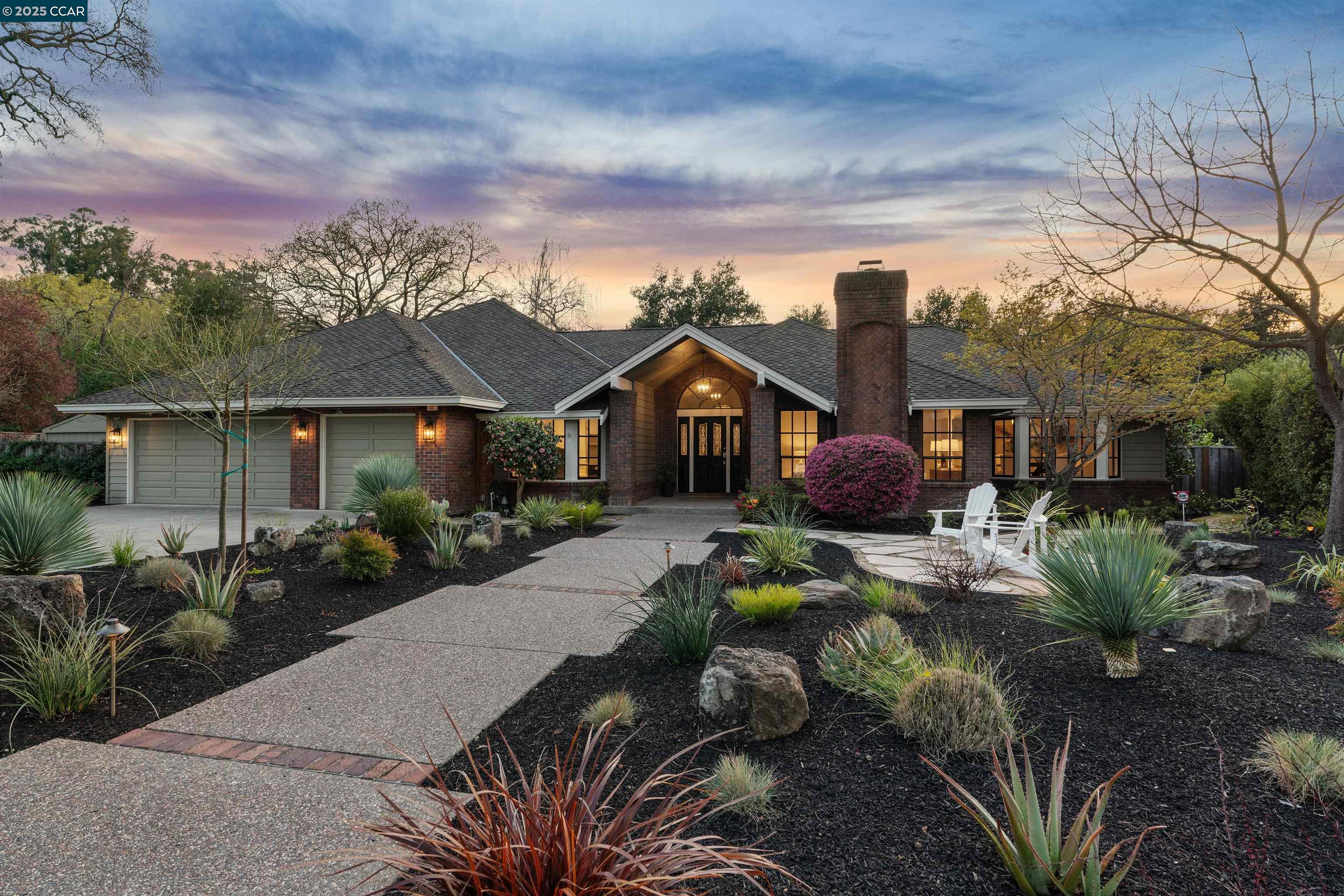 607 Burton Drive Lafayette, CA 94549 - Photo 1 of 1 a front view of house with yard and green space