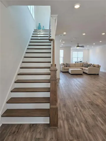 a view of a room with stairs and a couch