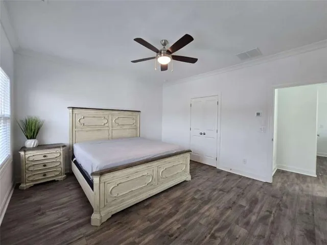 wooden floor with a cabinet