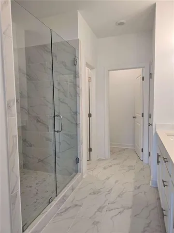 a bathroom with a sink a vanity and a mirror