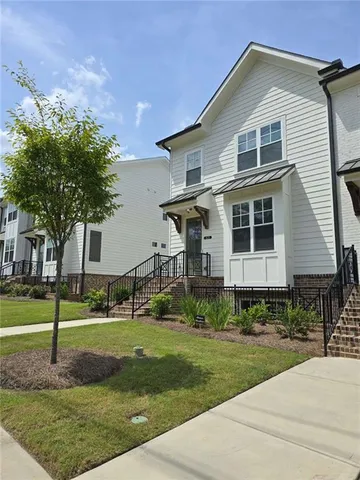 a house view with a outdoor space