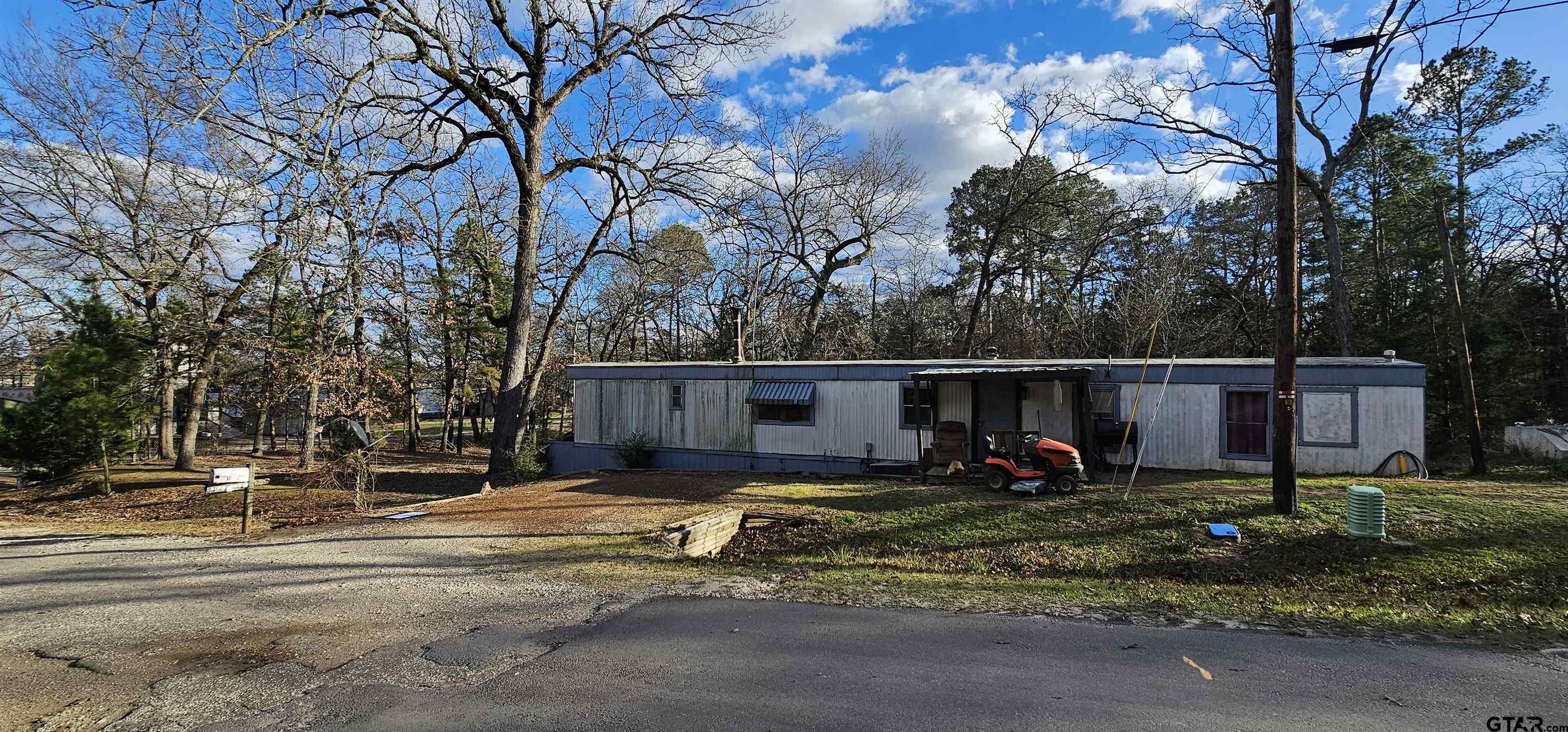240 Elm Drive Murchison, TX 75778 - Photo 1 of 19 a view of backyard with green space