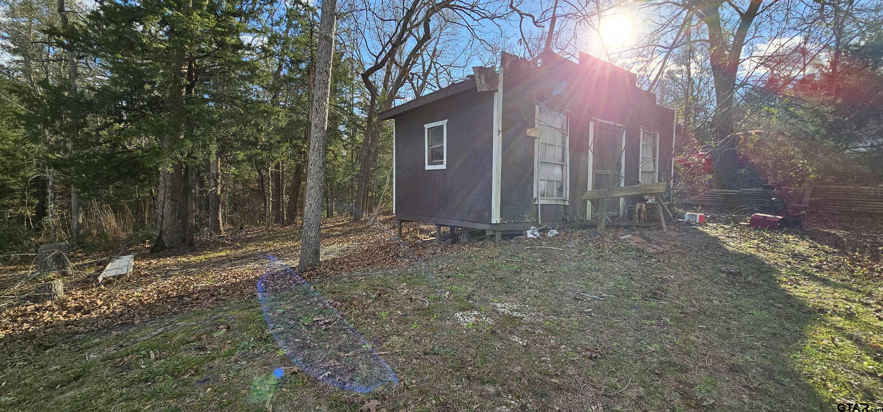 240 Elm Drive Murchison, TX 75778 - Photo 12 of 19 a view of a house with a yard