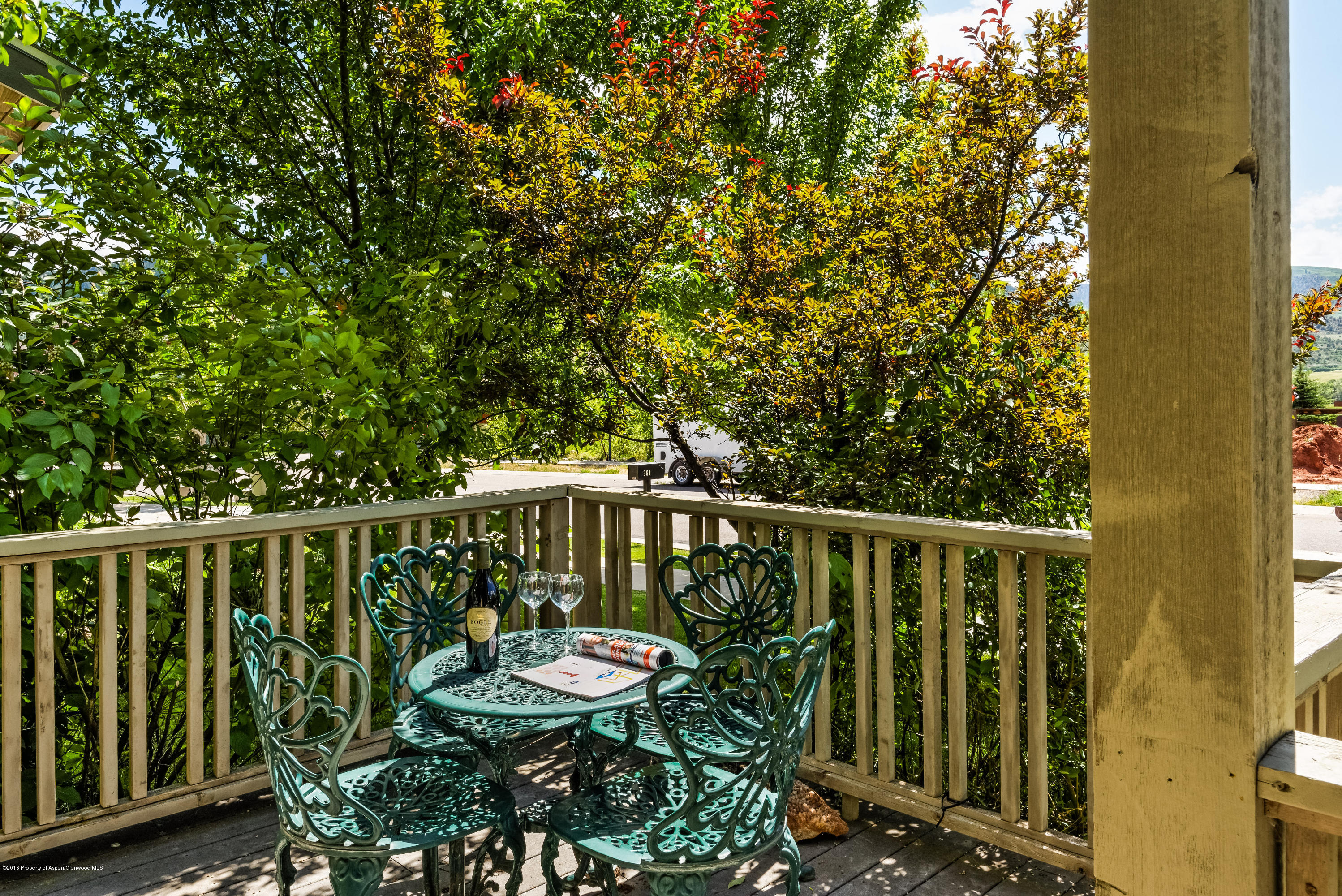 357 Sopris Circle Basalt, CO 81621 - Photo 12 of 24 a balcony with wooden floor and outdoor seating