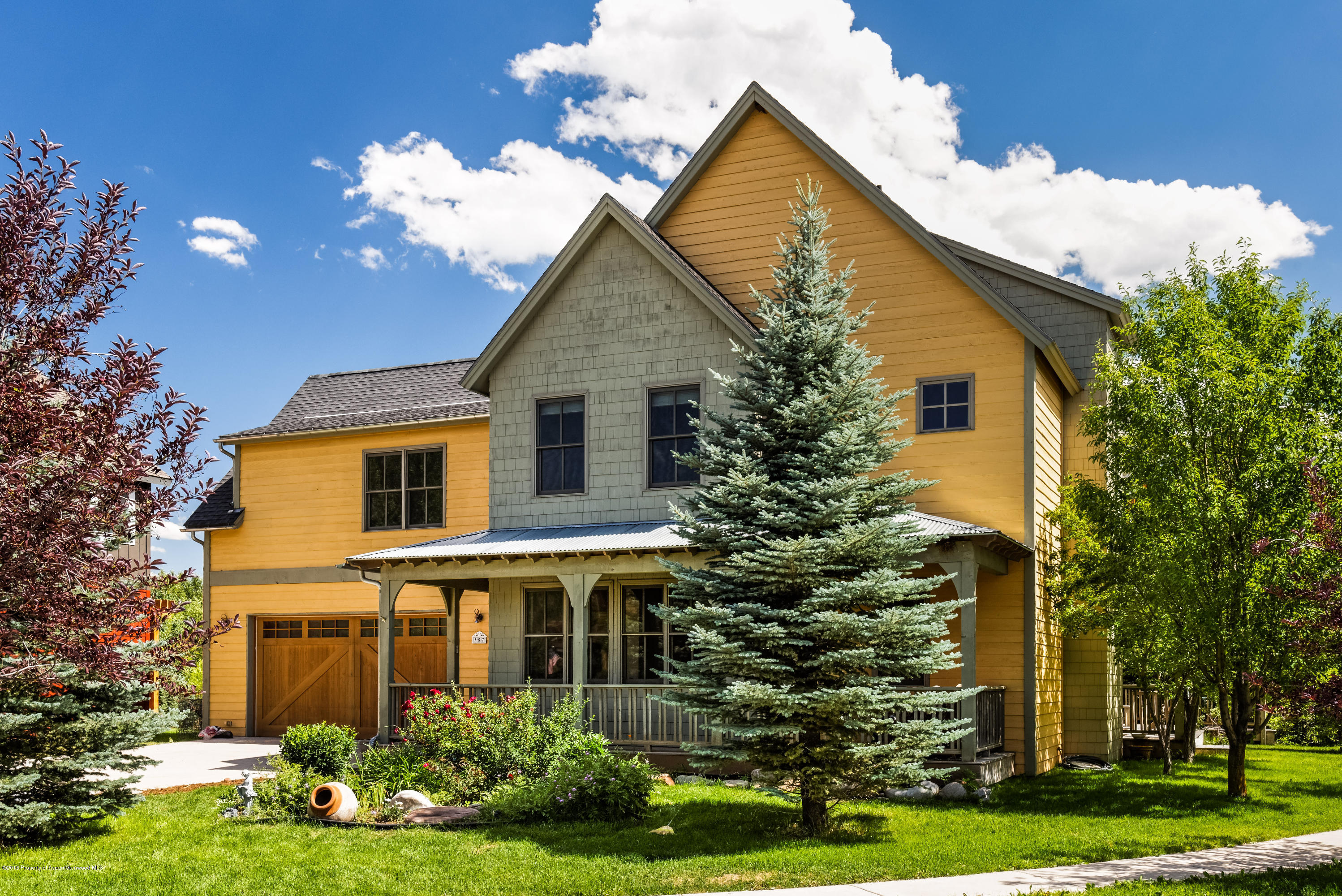 357 Sopris Circle Basalt, CO 81621 - Photo 2 of 24 a front view of house with yard