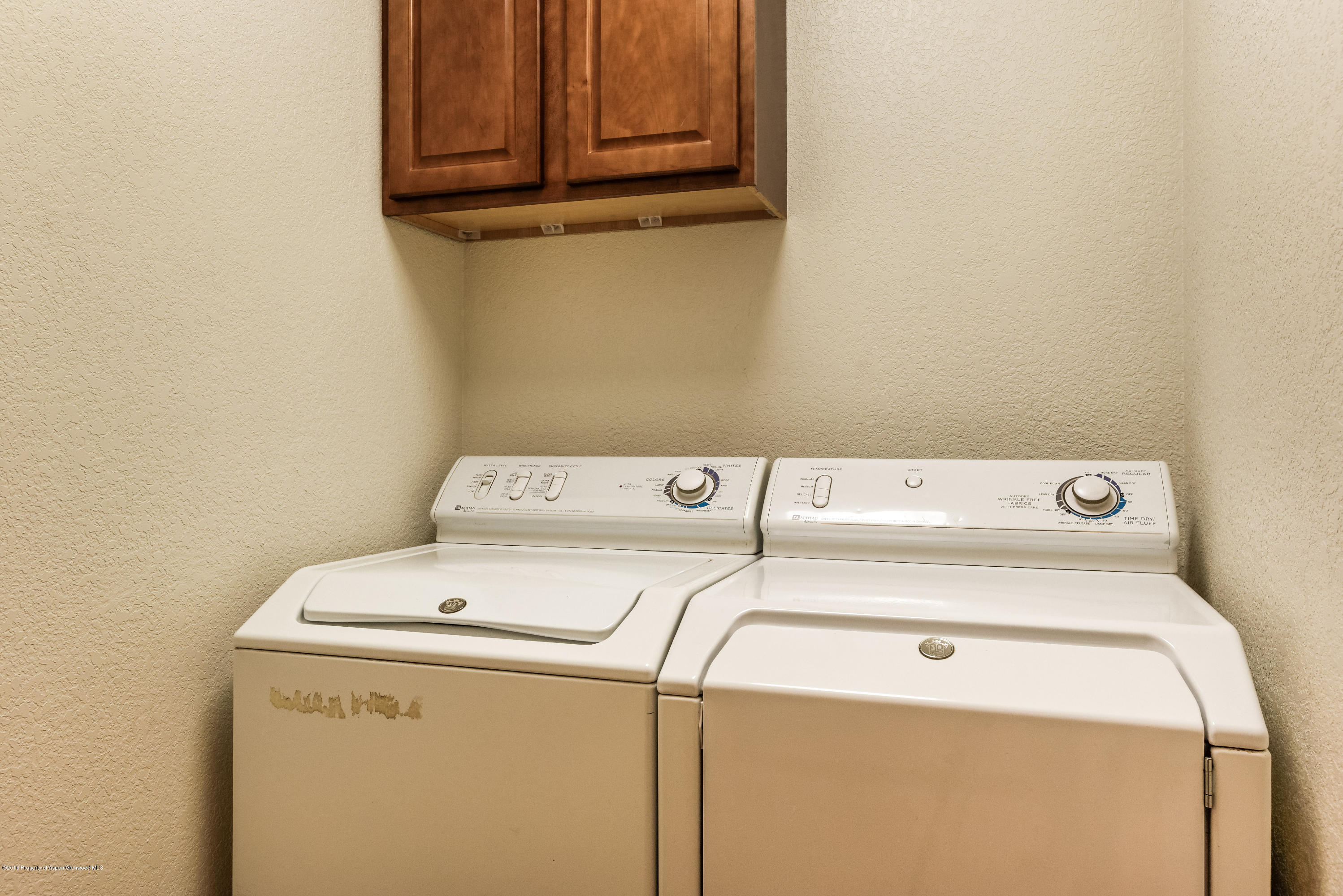357 Sopris Circle Basalt, CO 81621 - Photo 22 of 24 a utility room with dryer and washer